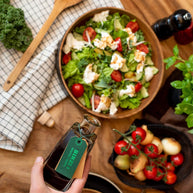 BIRZĪ apple syrup served over a fresh salad