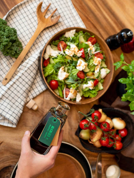 BIRZĪ apple syrup served over a fresh salad
