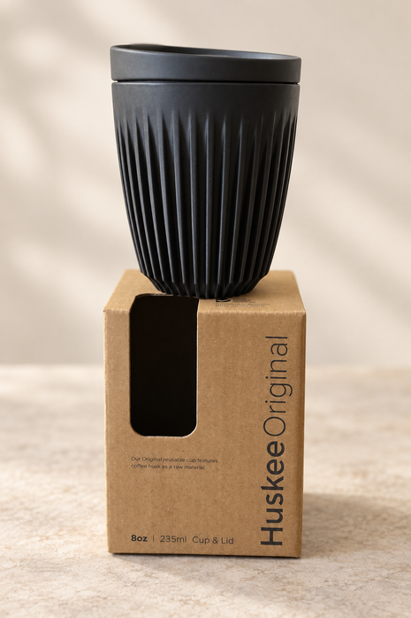 HuskeeOriginal 8oz Charcoal cup on original packaging
