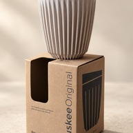 HuskeeOriginal 8oz Natural cup on original packaging