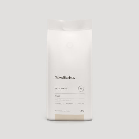 Naked Barista Uncovered — producer’s 1kg bag shown; listing is for 500g whole beans