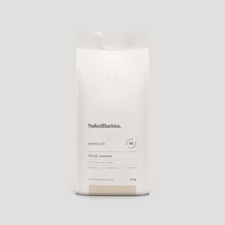 Naked Barista Unveiled — producer’s 1kg bag shown; listing is for 500g whole beans